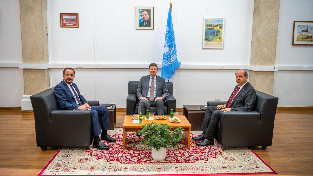 The top United Nations official in Cyprus, Colin Stewart (center), with the Greek Cypriot leader, Nikos Christodoulides (left)  and the Turkish Cypriot leader, Ersin Tatar (right).