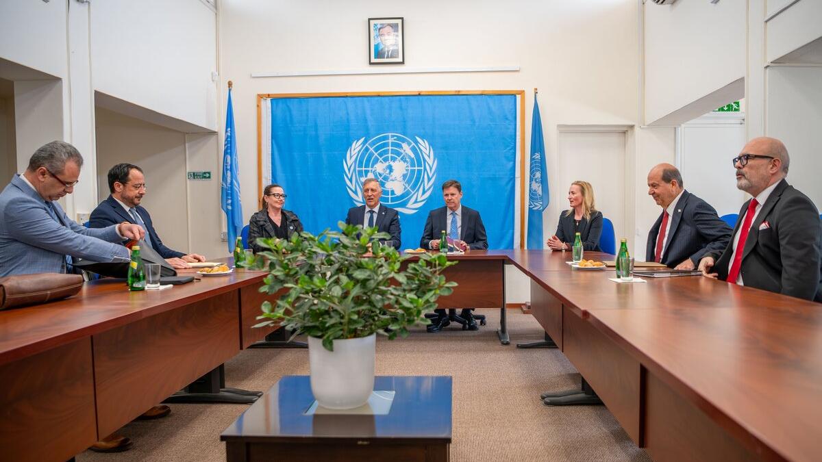 The Greek Cypriot leader, Nikos Christodoulides, and the Turkish Cypriot leader, Ersin Tatar