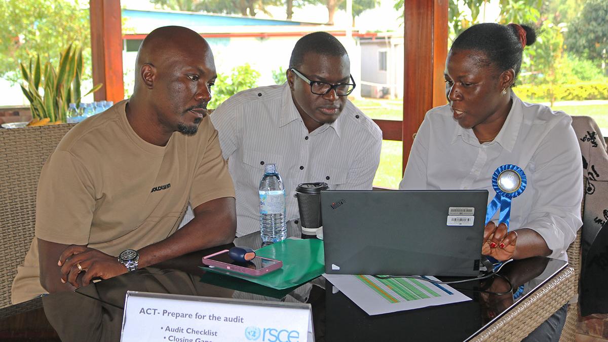 Client Service Section staff consult LARRMU representative on their ISO documentation