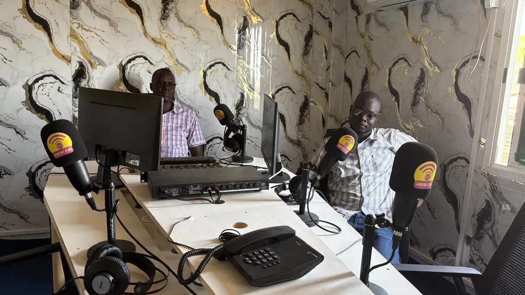 Karbino Dut Aguek with his colleague Makuac Deng Ayei in Abyei FM’s new studio