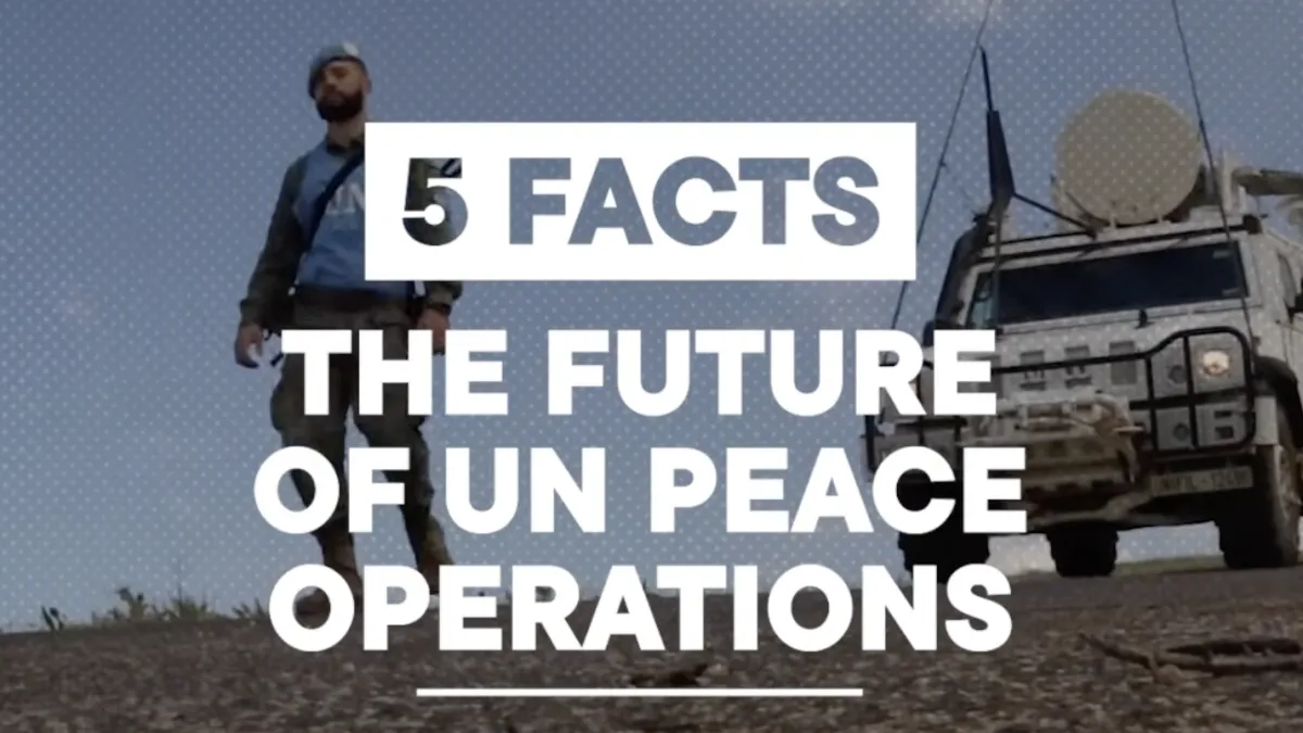 Video cover one peacekeeper walking ahead of a vehicle.