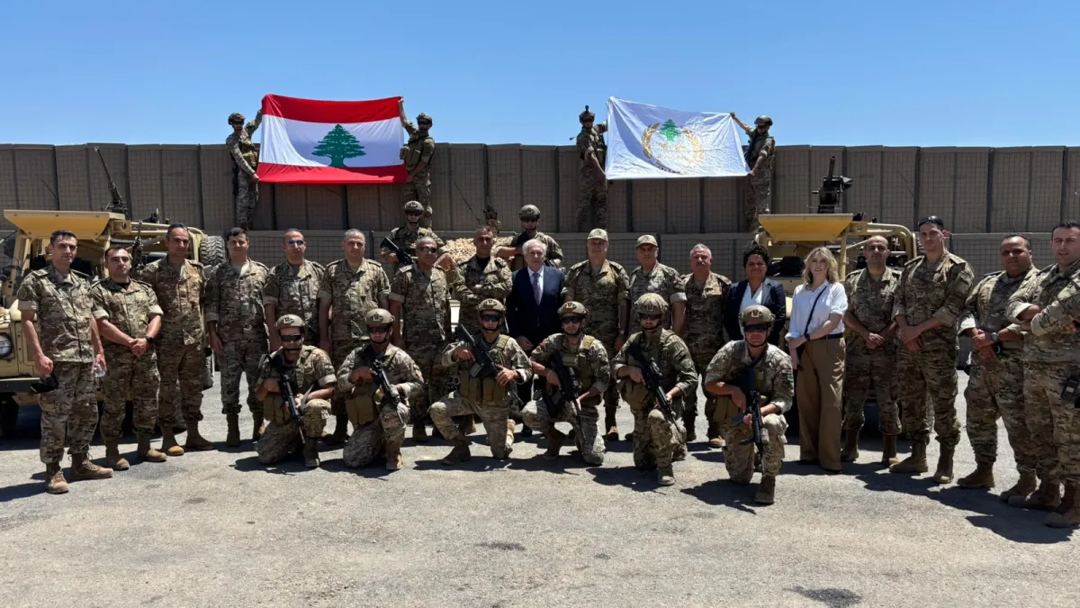 Arnault surrounded by soldiers at Border Regiment 3