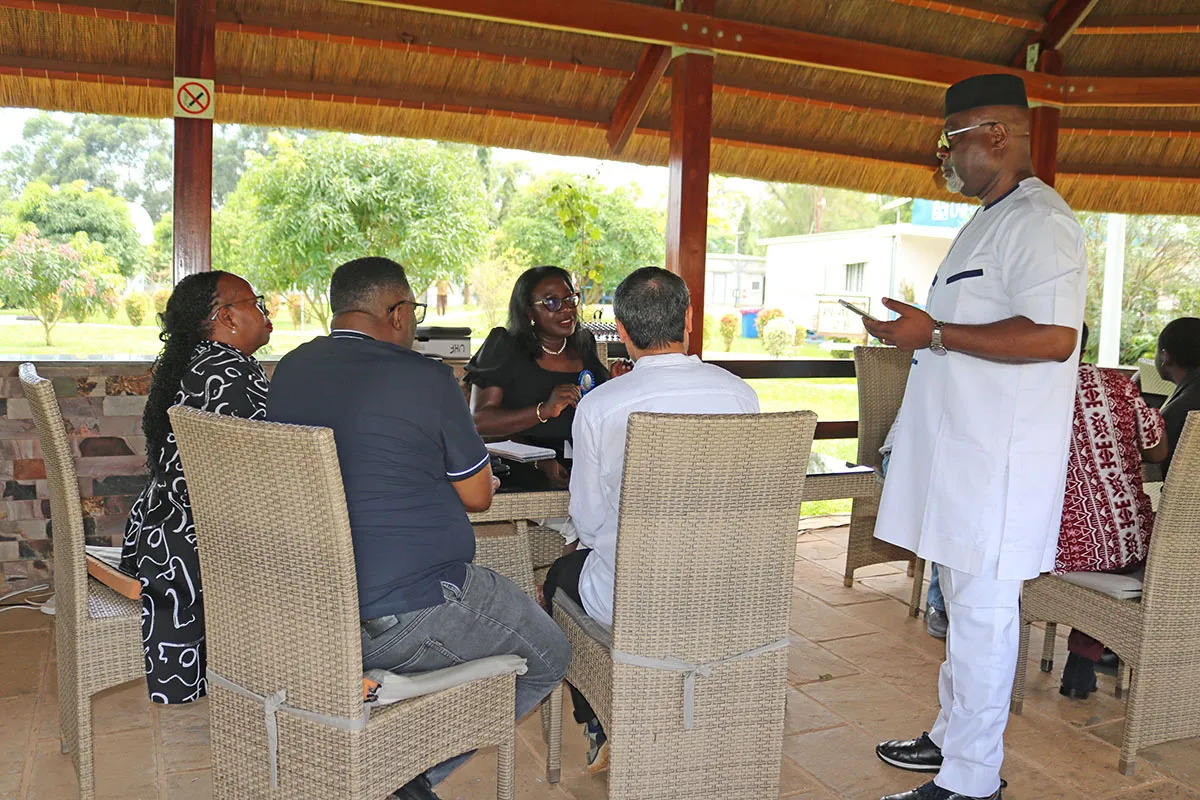Director RSCE, Mr. Paulin Djomo (standing) talks to Chief LARRMU, Elise Metougue and some RSCE staff members on the importance of the ISO Awareness Clinic. Director RSCE, Mr. Paulin Djomo (standing) talks to Chief LARRMU, Elise Metougue and some RSCE staff members on the importance of the ISO Awareness Clinic.