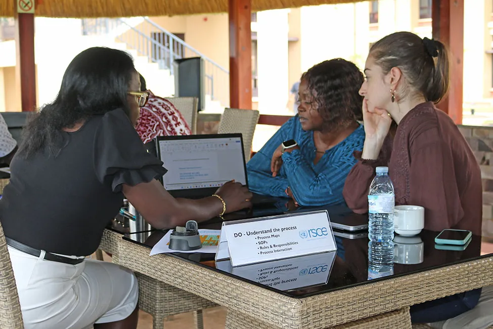 Staff from UNCAP consult with Chief LARRMU, Elise Metougue on their QMS Policy alignment Staff from UNCAP consult with Chief LARRMU, Elise Metougue on their QMS Policy alignment