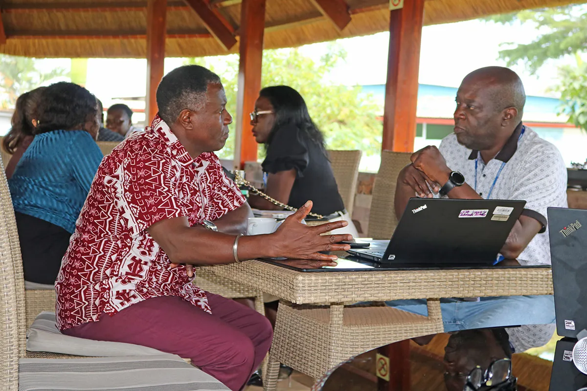 Chief of Regional IT Security Unit, Michael Mwaura (l) talks with ISO Consultant Chief of Regional IT Security Unit, Michael Mwaura (l) talks with ISO Consultant