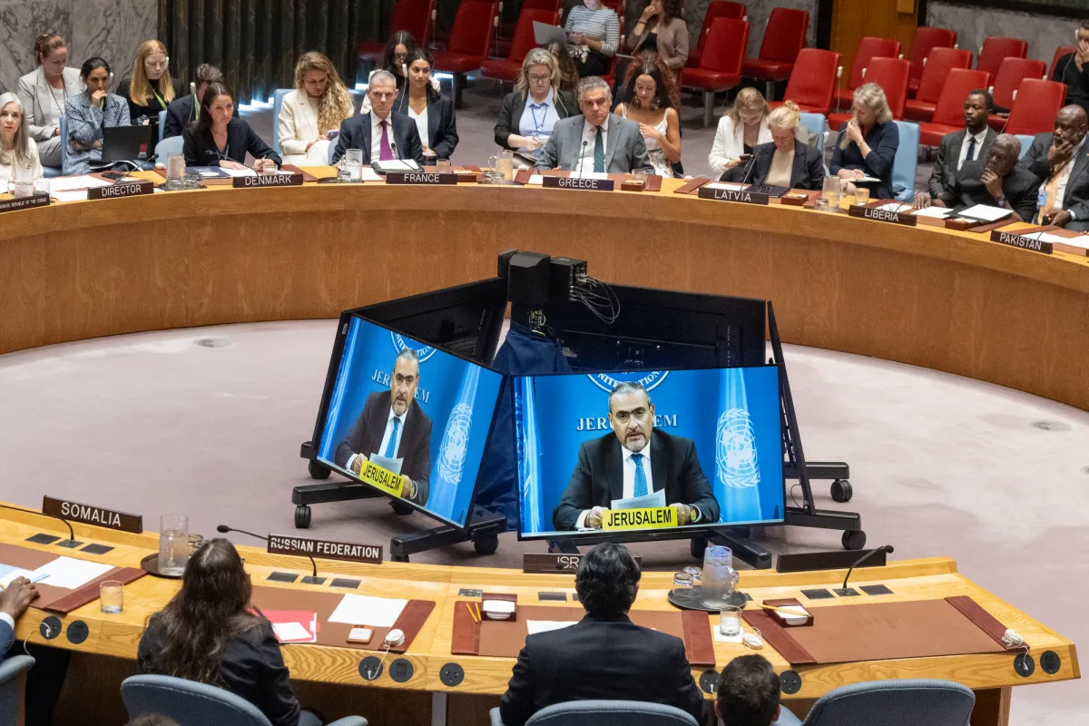 Ramiz Alakbarov (on screens), Deputy Special Coordinator for the Middle East Peace Process, United Nations Resident and Humanitarian, briefs the Security Council meeting on the situation in the Middle East, including the Palestinian question.