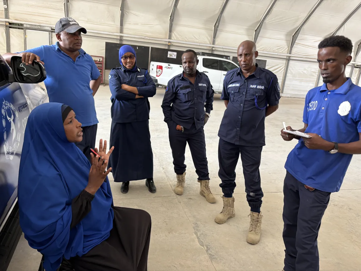 Female and male SPF EOD officers train side by side at a facility in Mogadishu