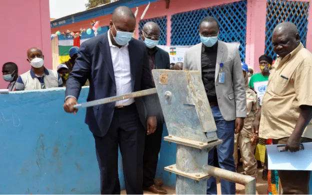 MINUSCA representatives and local authorities in Bria inaugurate a human-powered water well that provides clean water to the community, helping create a safer environment for all in the conflict-affected area. (Photos courtesy of MINUSCA CVR Section)