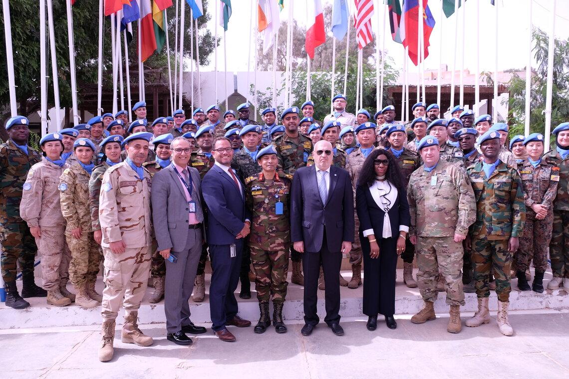MINURSO Acting Force Commander, Major General Md Main Ullah Chowdhury with the MINURSO team during his farewell ceremony. Photo credit: UN Photo/MINURSO