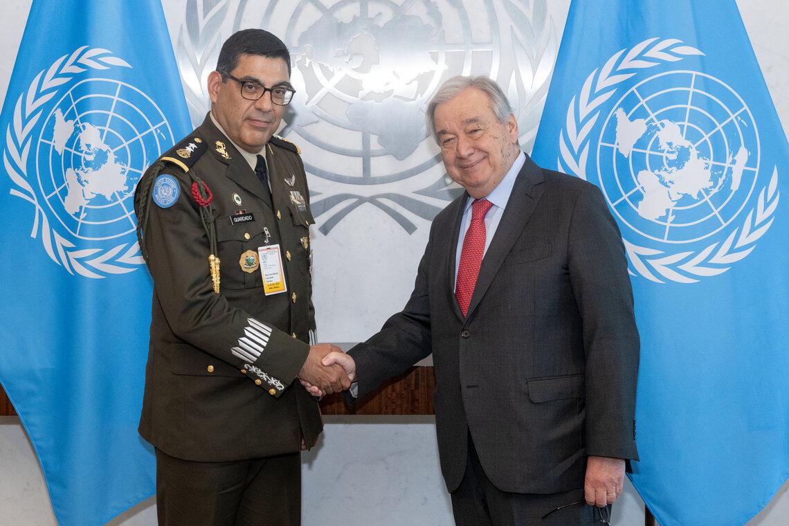 UN Secretary-General António Guterres shaking hands with Ramon Guardado Sanchez.