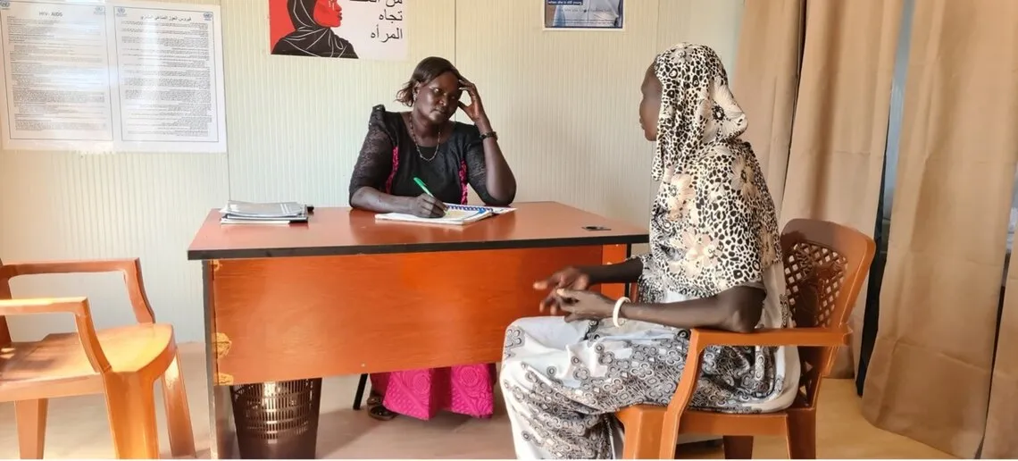Atoch hears out victims at the new desk, where two beds allow for victims whose life is threatened to remain in safety if needed. Photo courtesy: UNISFA